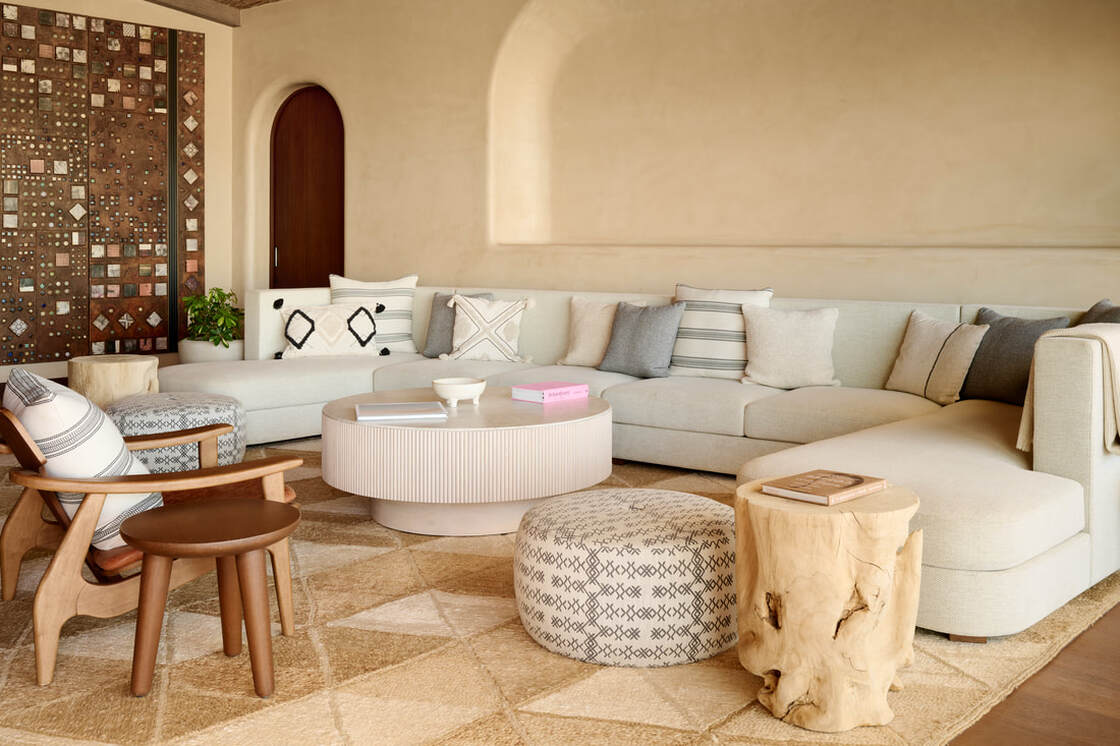 A living room with seamless hand-applied walls and floor