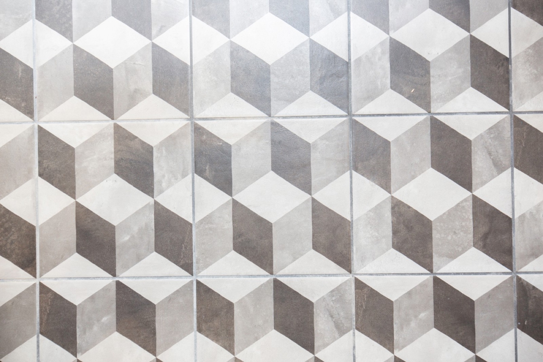 Close-up of the grey 3D-cube pattern floor tiling